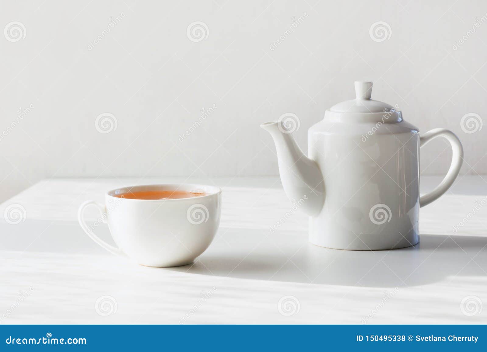 Time for Tea. Set of Cup and Teapot on White Stock Photo - Image of