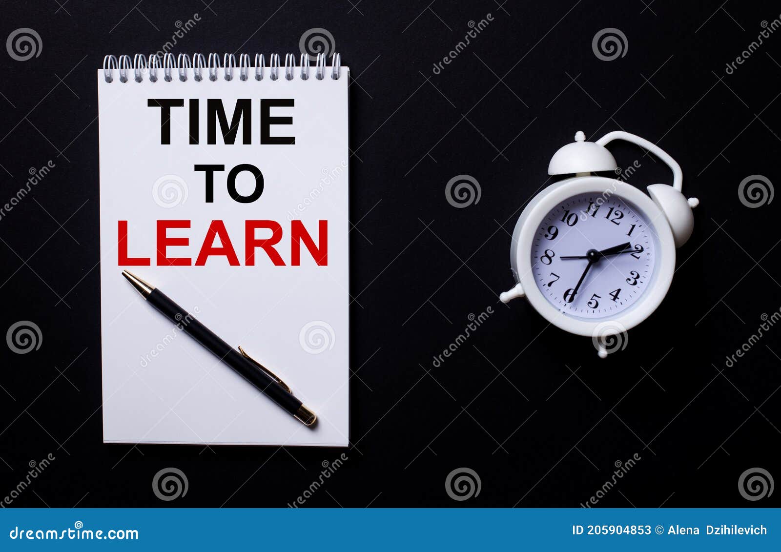 TIME TO LEARN is Written in a White Notepad Near a White Alarm