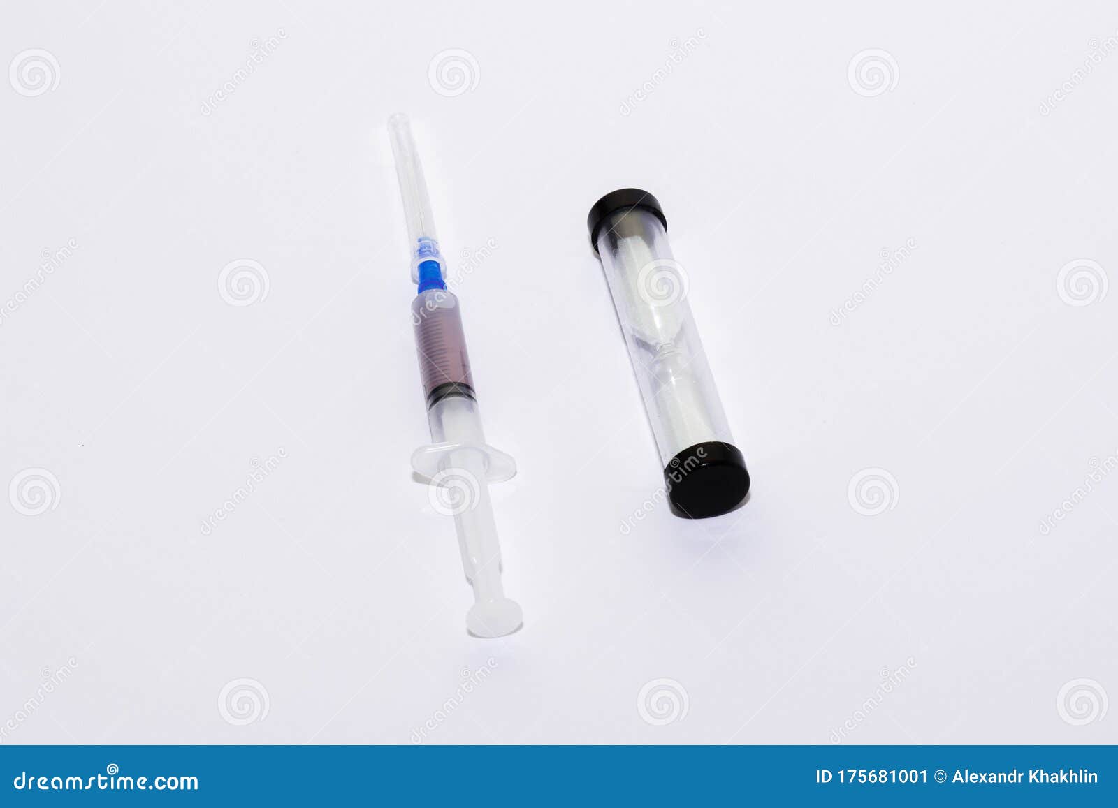 timer and syringe on white background isolate