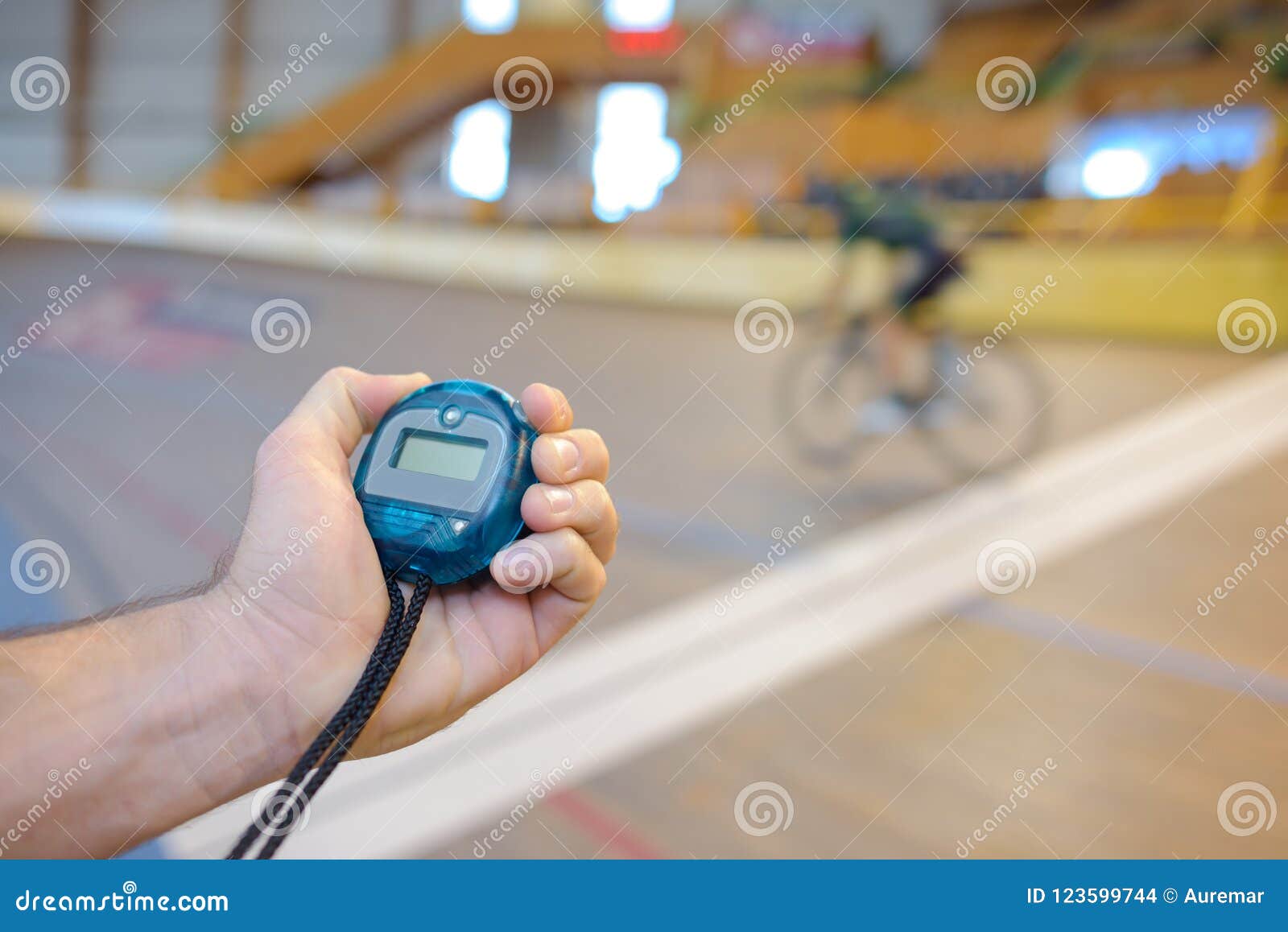 timing cyclist training in velodrome