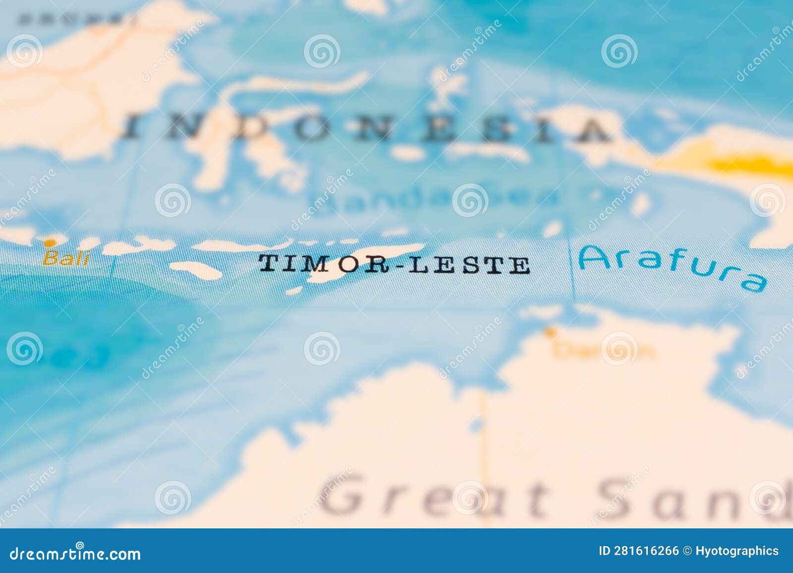 timor-leste in focus on a tilted world map.