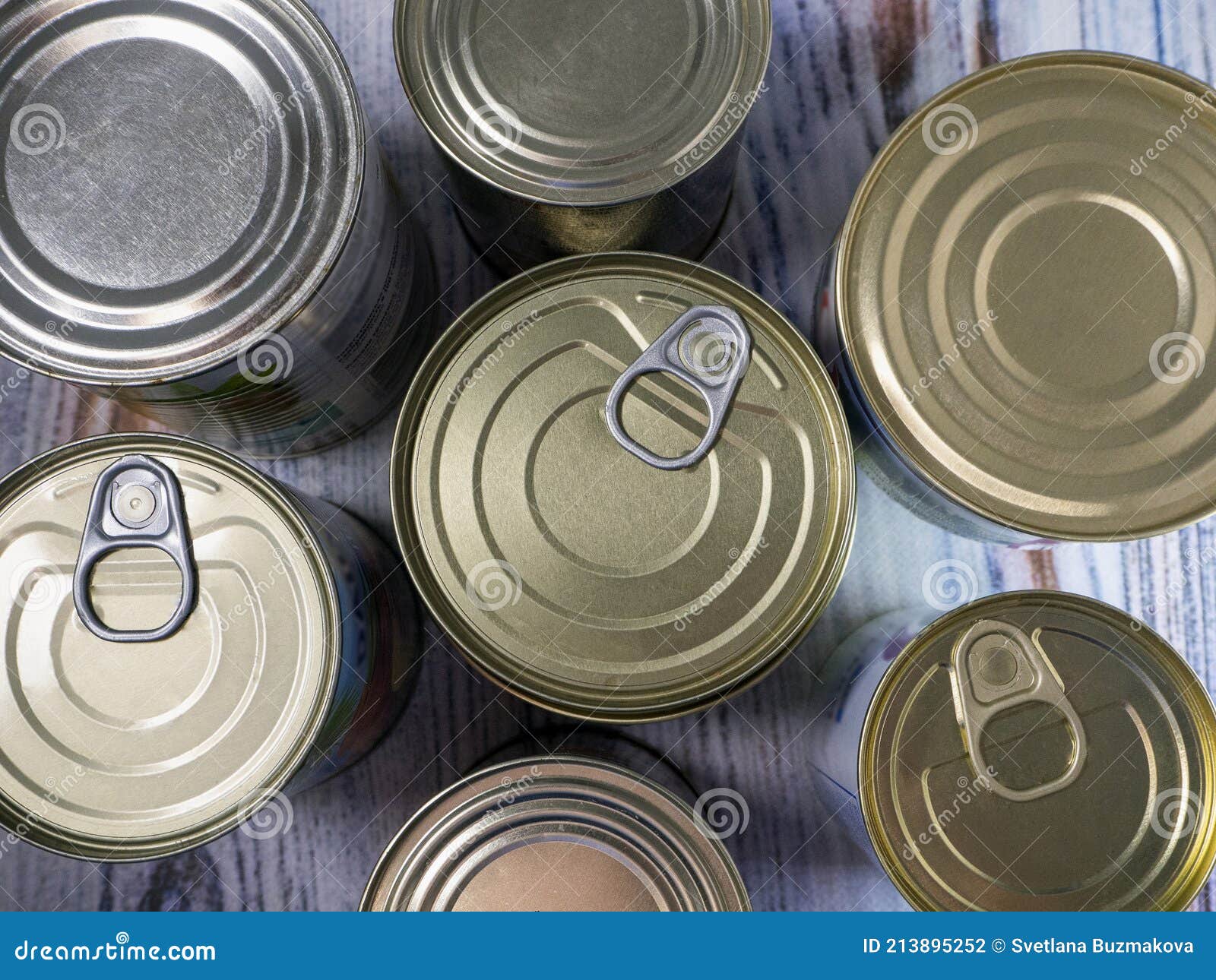 Tin Cans with Processed Food for Longterm Storage, Closeup. Food