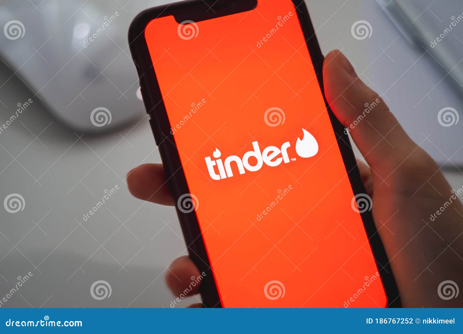 Tinder Logo on Smartphone Screen Editorial Photography Illustration