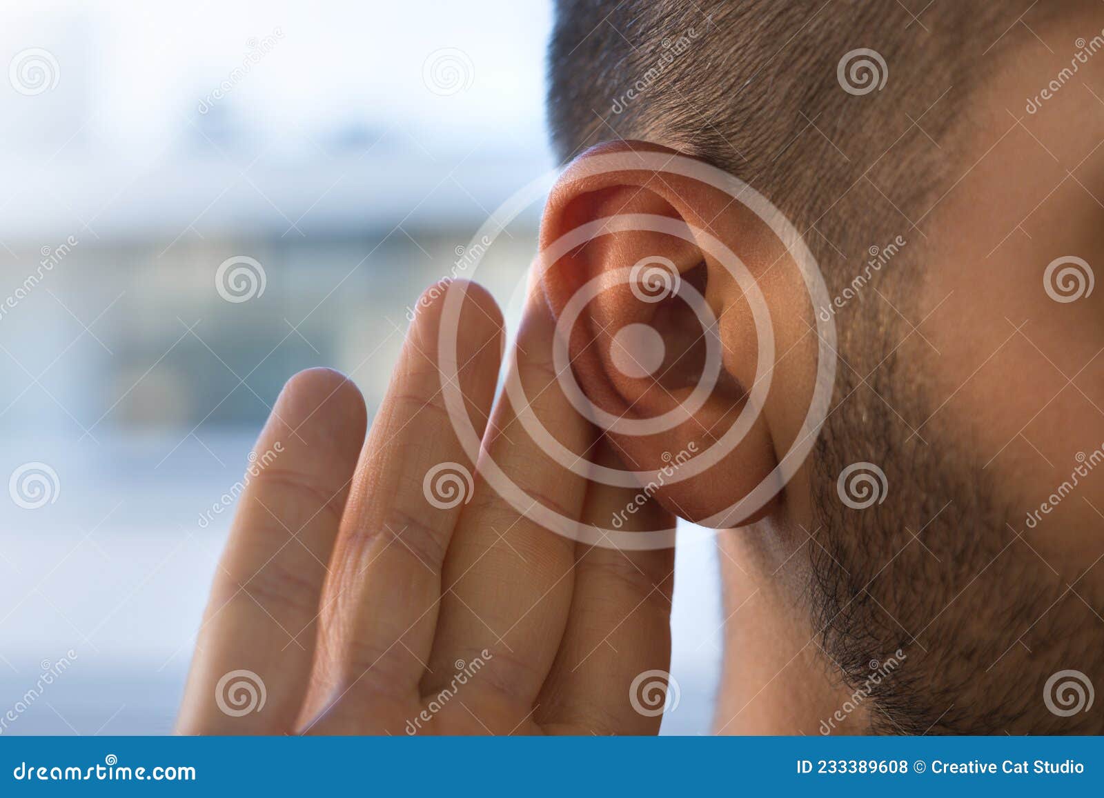 Tinnitus. Young Man with Hearing Problems or Hearing Loss. Hearing Test