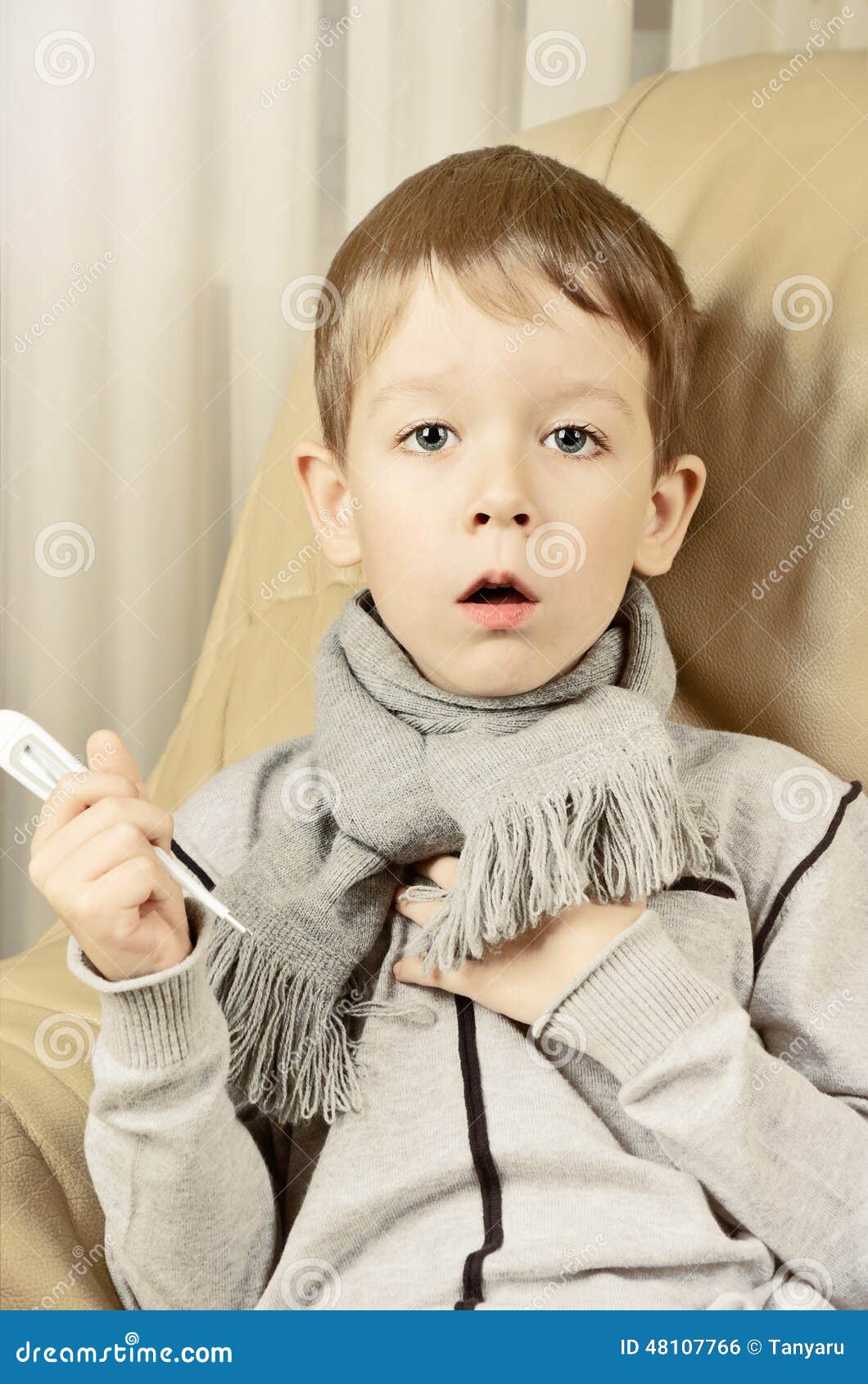 Tinted Image Boy Coughing and Holding a Thermometer Stock Photo Image