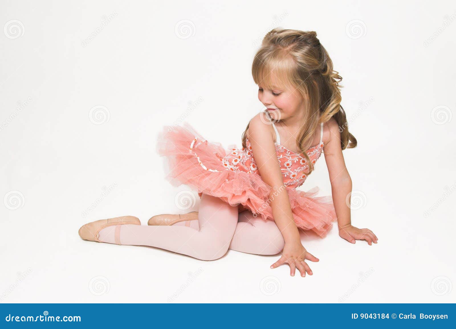 Tiny Ballerina Looking Down Photo Image of apricot, child: 9043184