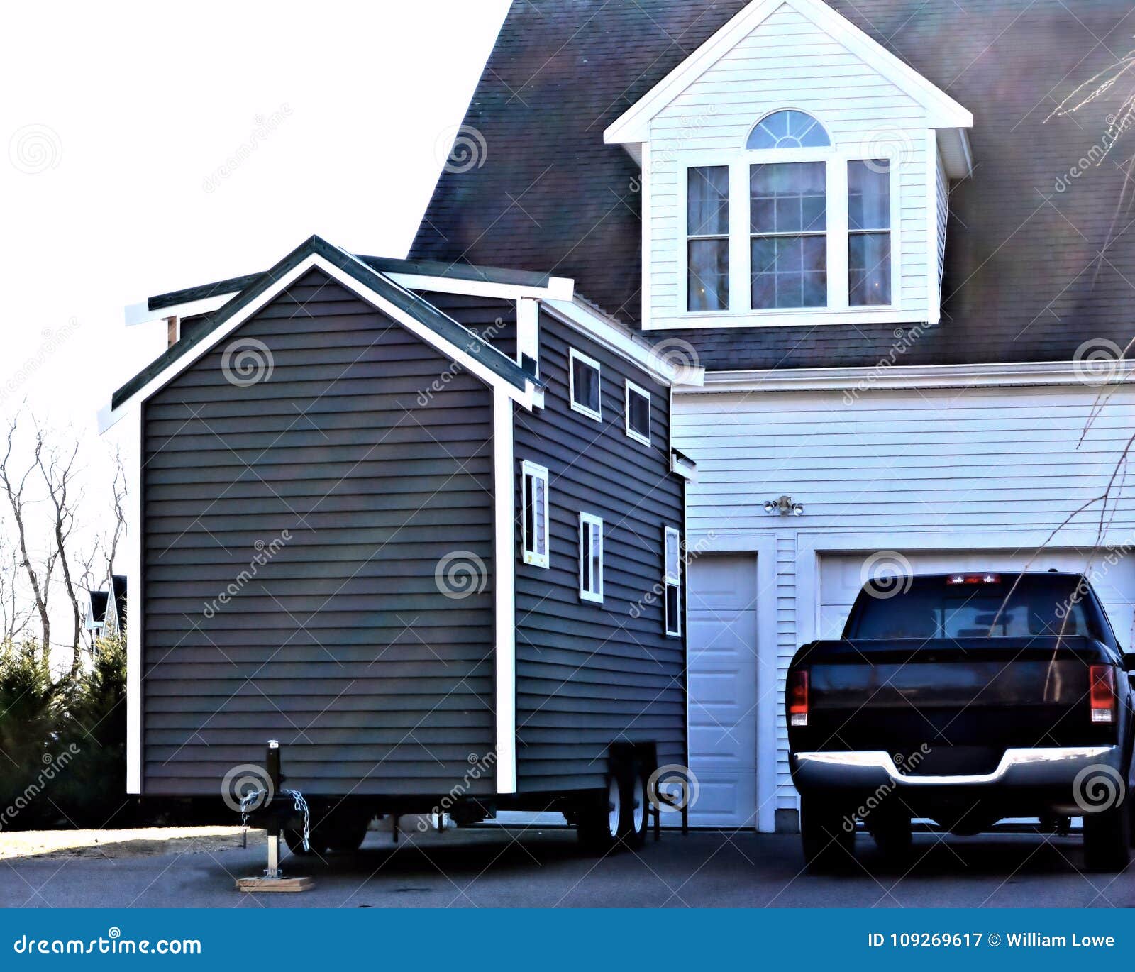 Tiny House Big Garage stock image. Image of small, friendly - 109269617