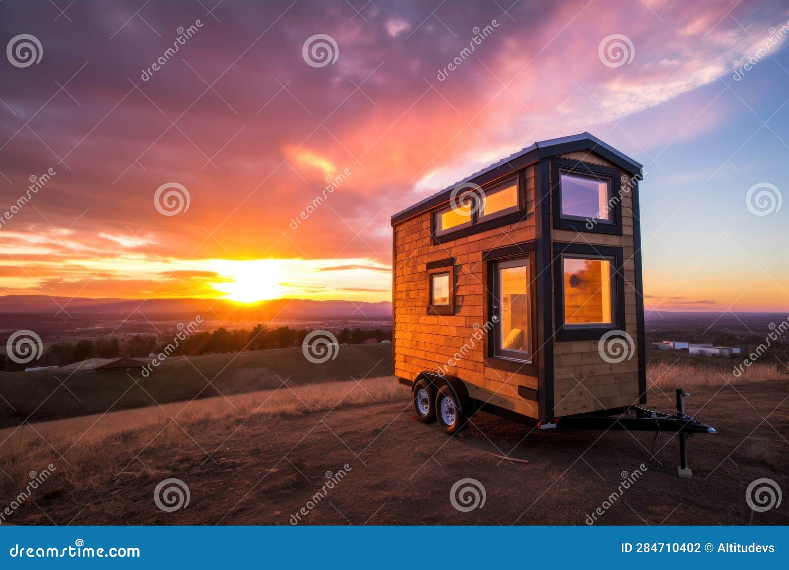 A Tiny House on Wheels, with a View of the Sunset Stock Photo Image