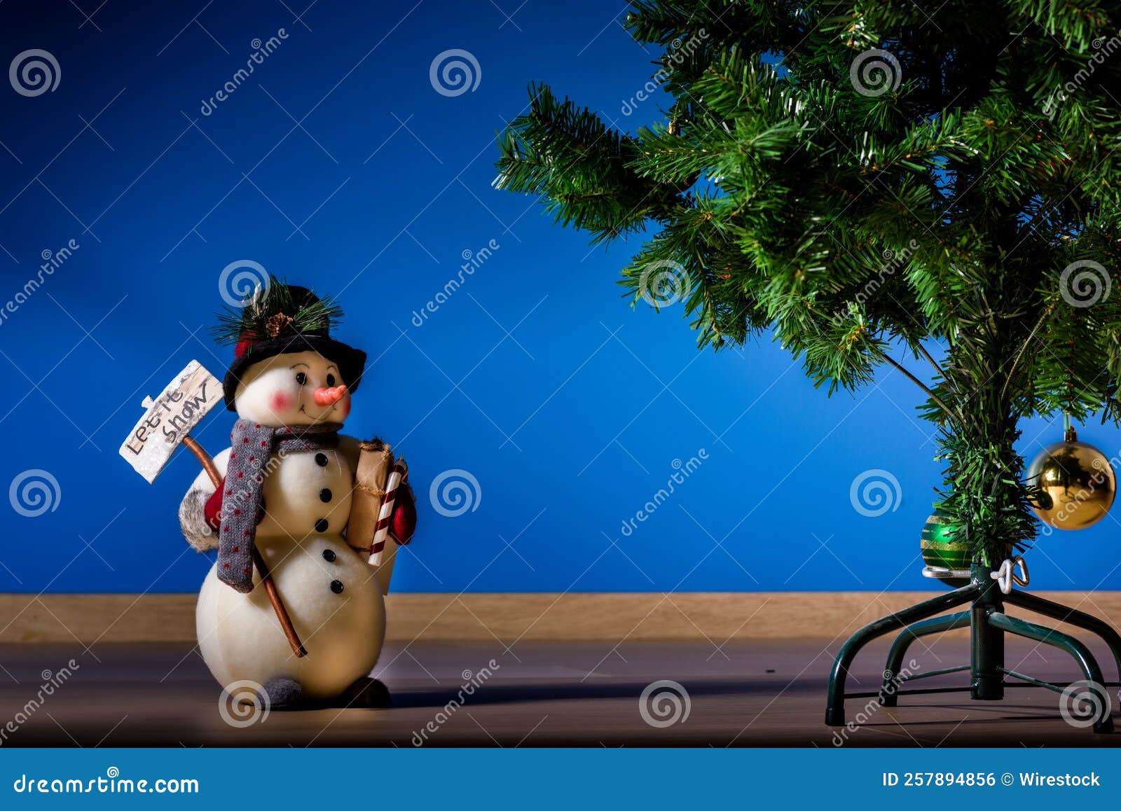 Tiny Snowman and a Christmas Tree Stock Photo Image of celebration