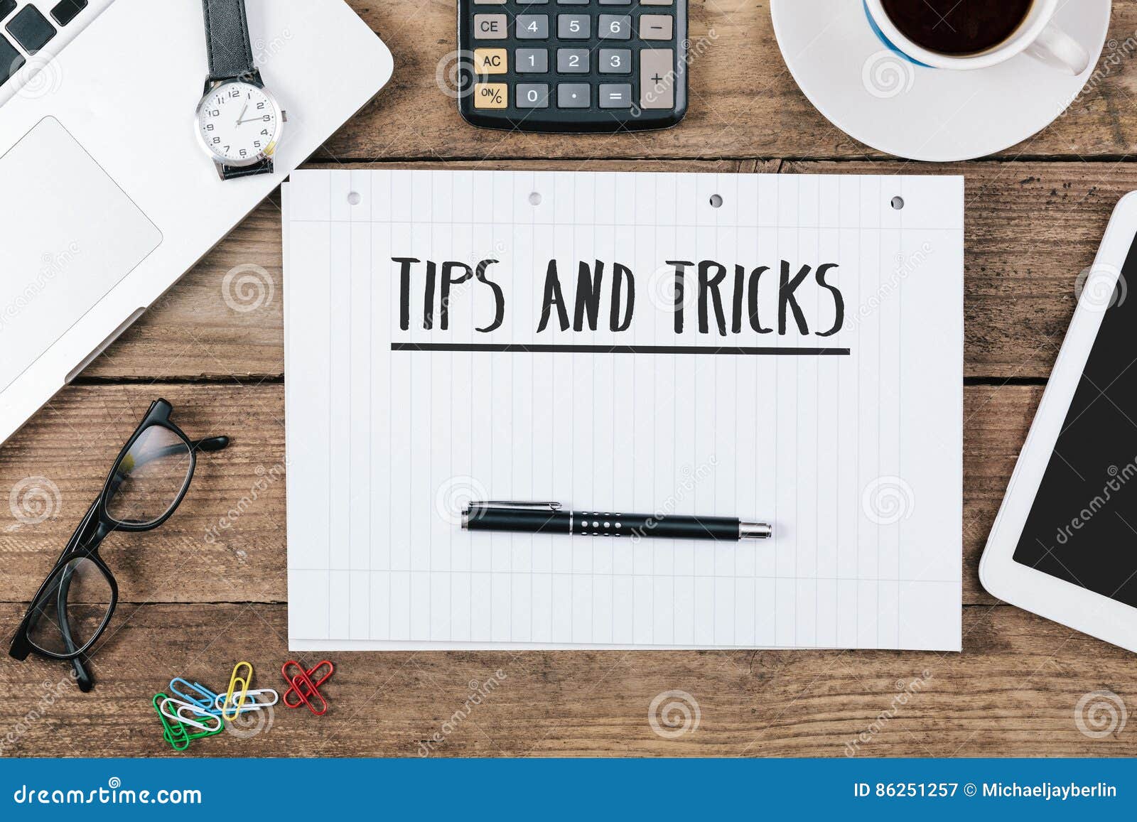 tips, tricks on notebook on office desk with computer technology
