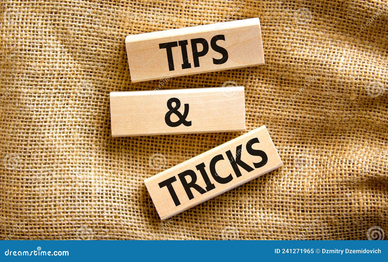 Tips and Tricks Symbol. Concept Words Tips and Tricks on Wooden Blocks