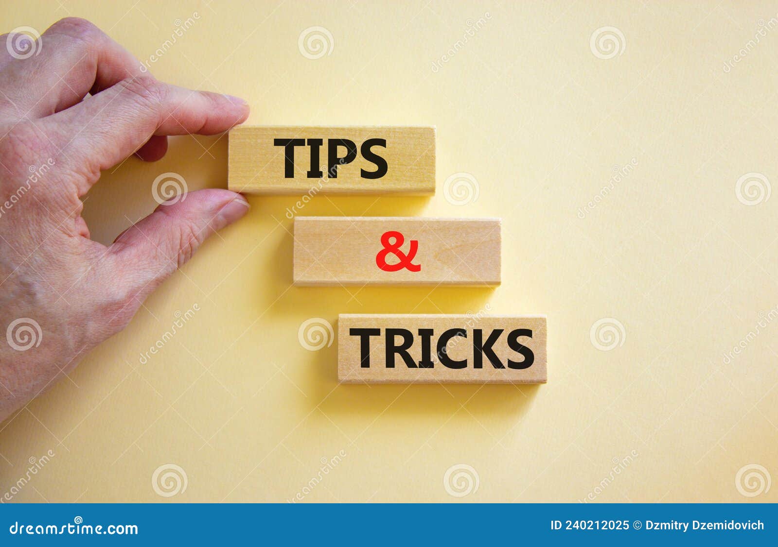 Tips and Tricks Symbol. Concept Words Tips and Tricks on Wooden Blocks