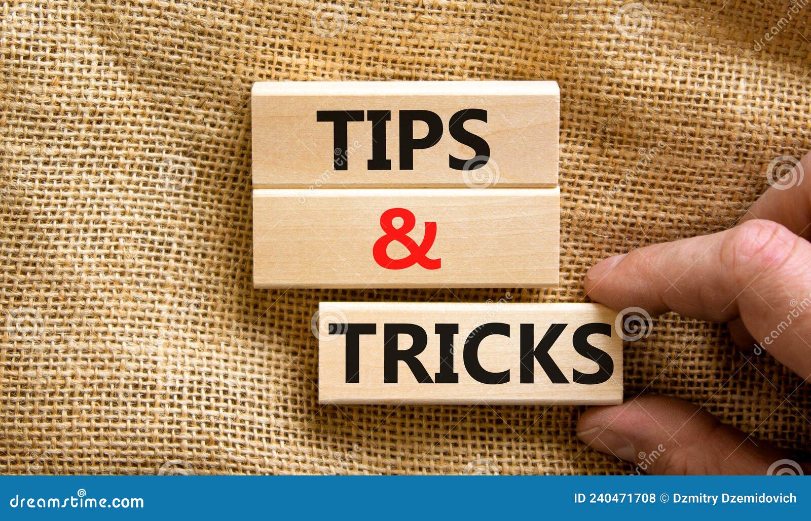 Tips and Tricks Symbol. Concept Words Tips and Tricks on Wooden Blocks