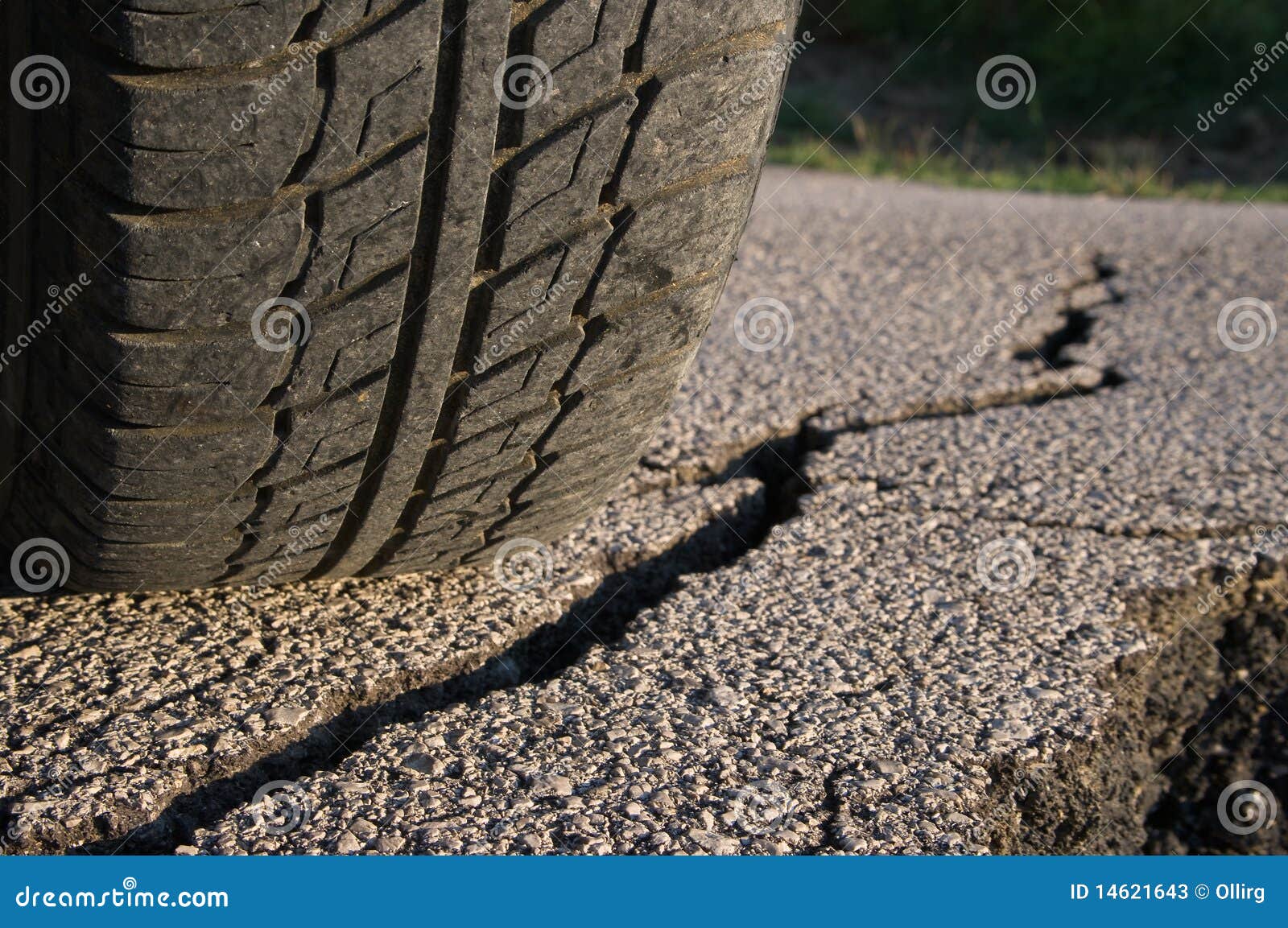 tire and cracked asphalt