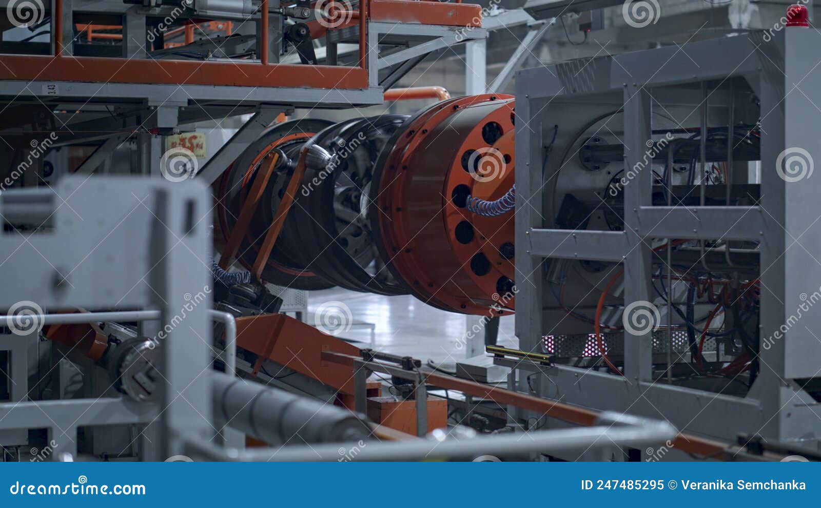 Tire Manufacturing Machine Rotating with Rubber Tape in Technological Stock Image