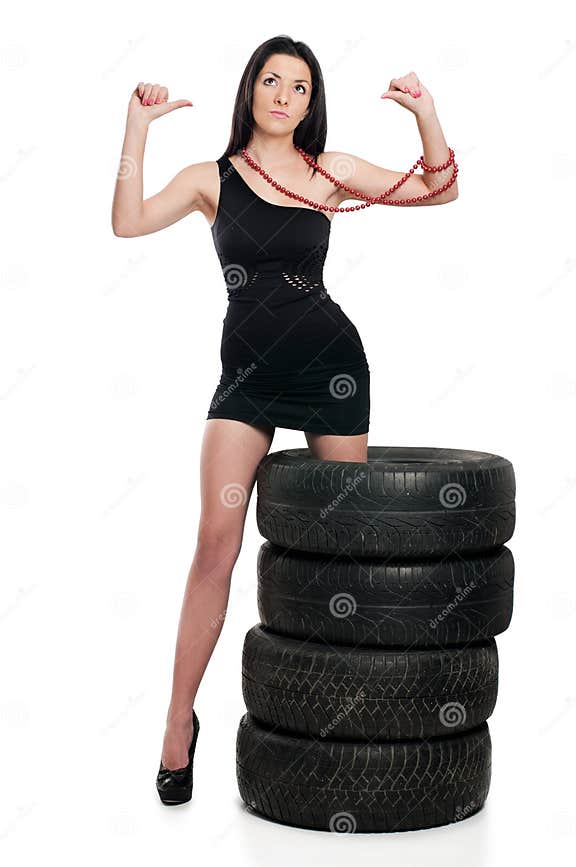 Tire and woman stock image. Image of auto, tire, rubber 16966025