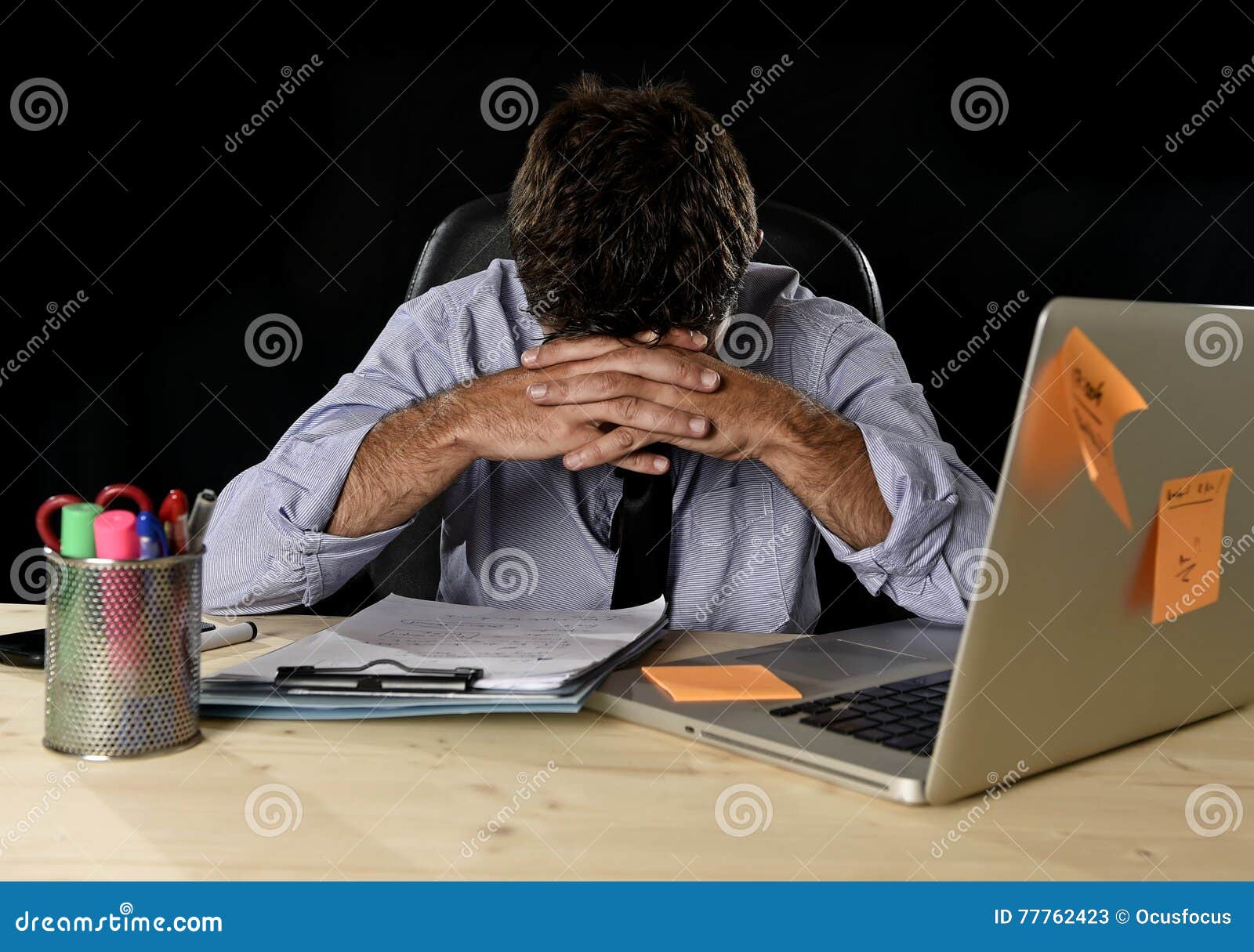 tired businessman suffering work stress wasted worried busy in office late at night with laptop computer