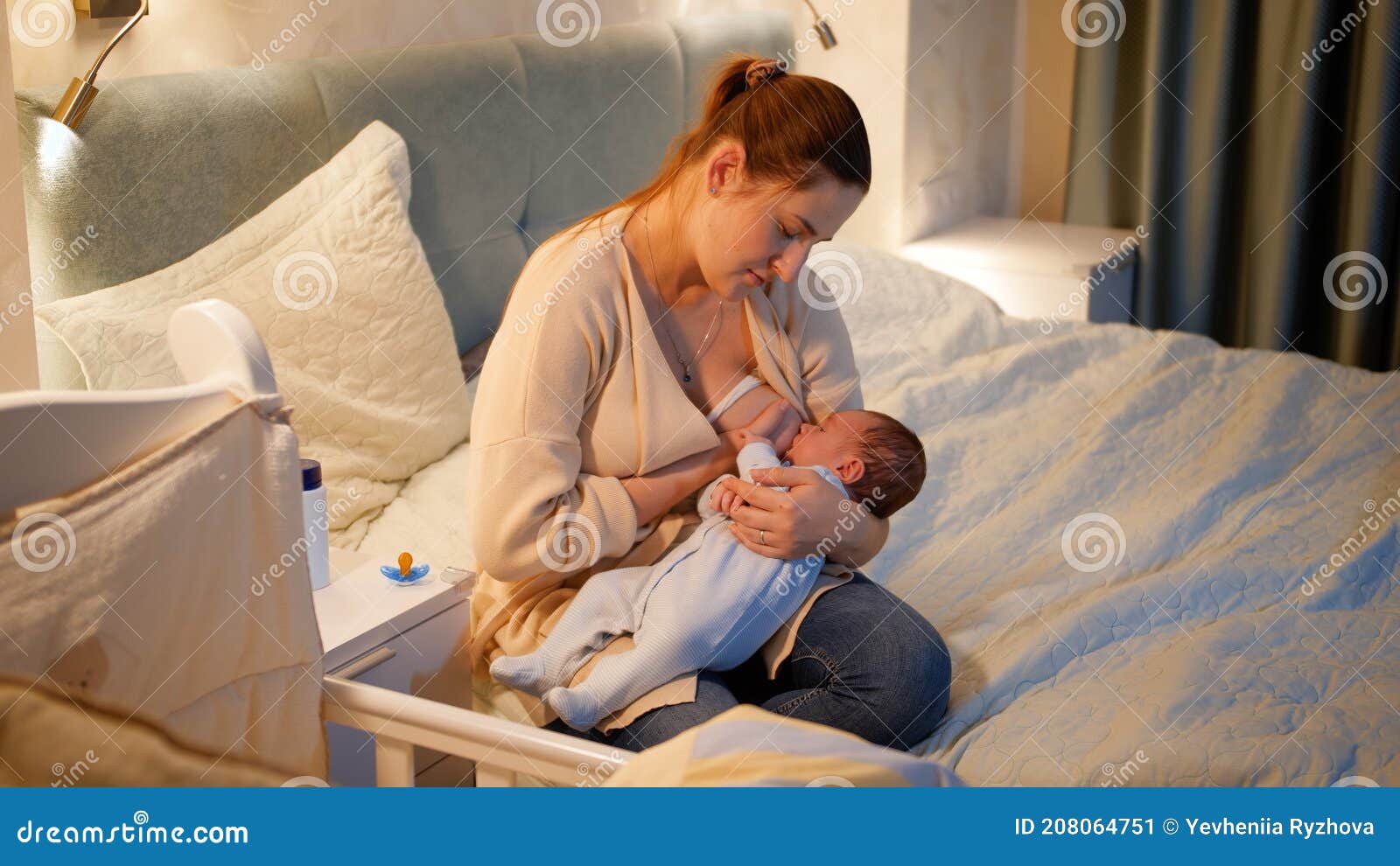 Tired and Exhausted Mother Falling Asleep while Feeding Her Newborn ...