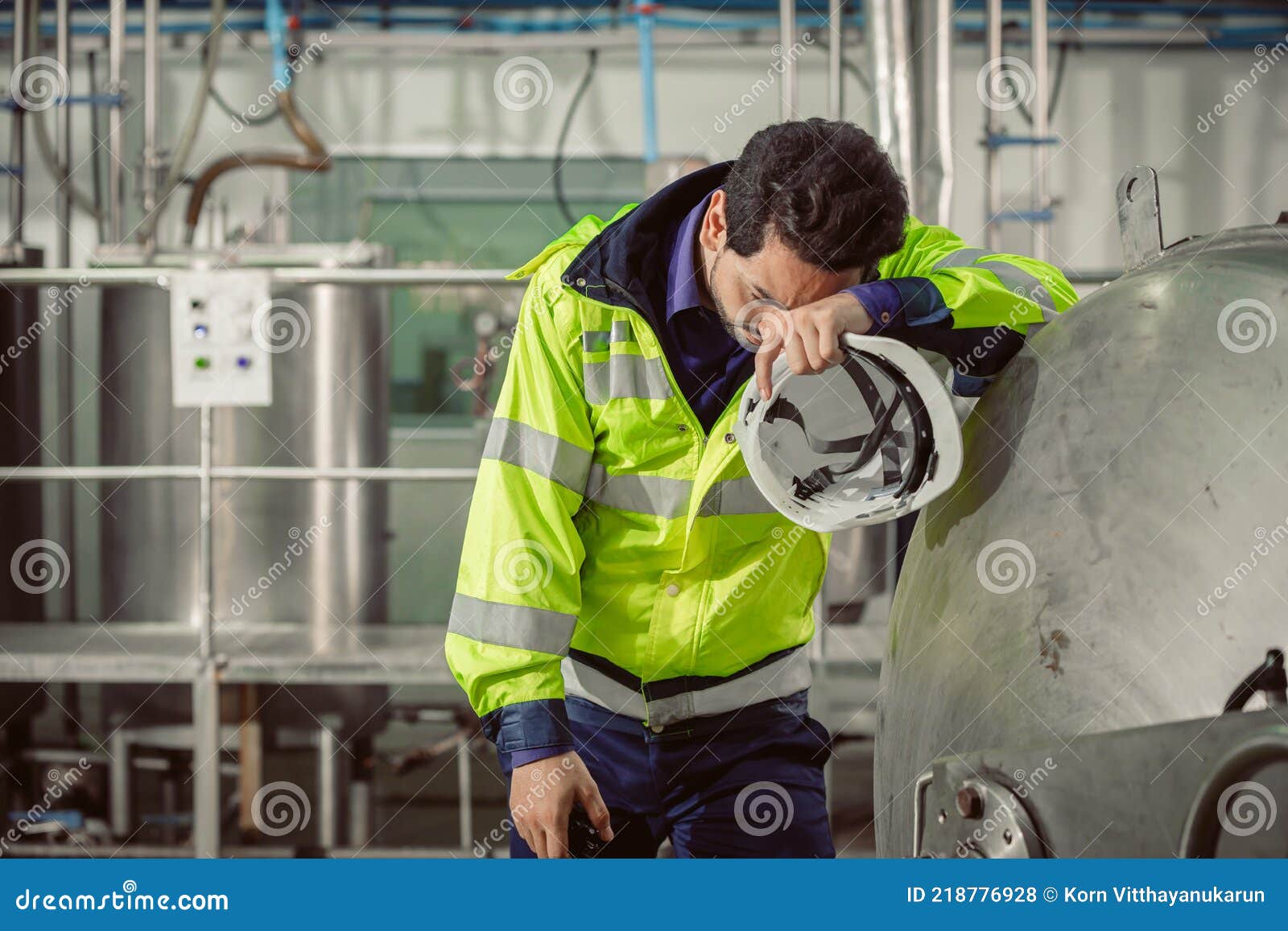 tired fatigue exhaustion engineer worker hard working in factory. worker sick from corona virus flu