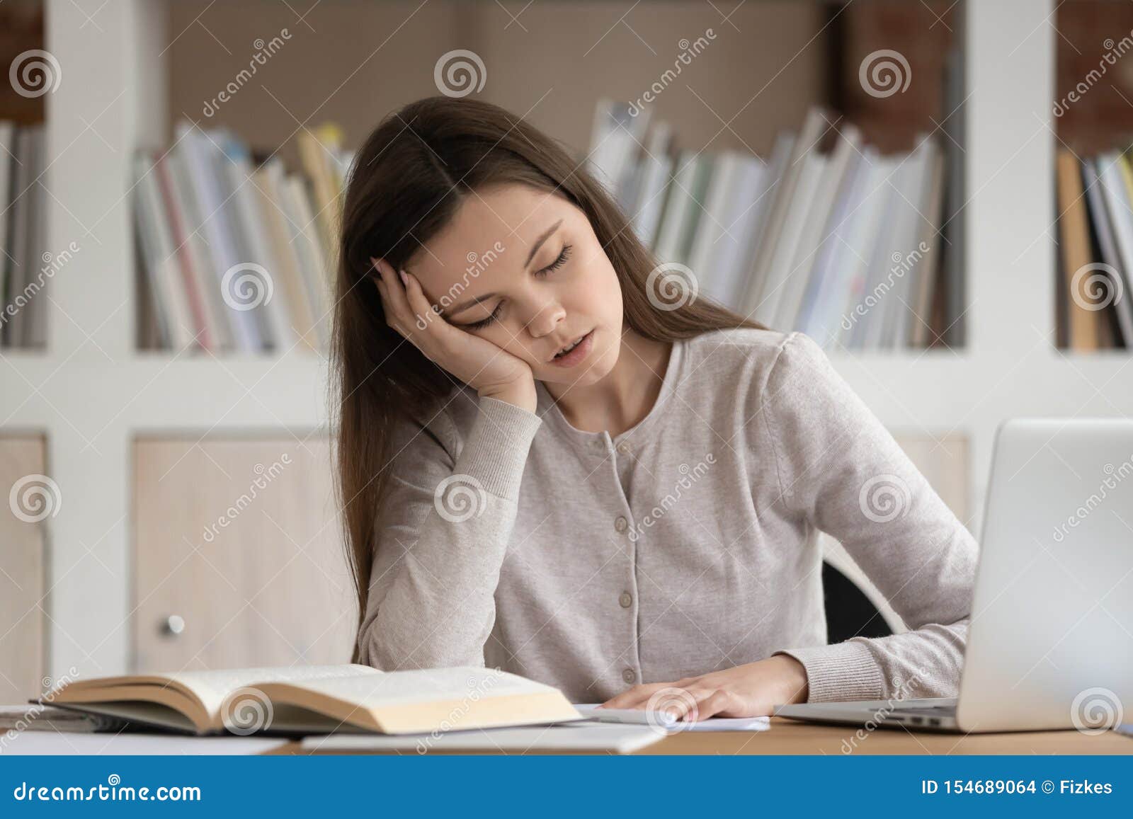 Tired Girl Student Fall Asleep Studying At Workplace Stock Photo