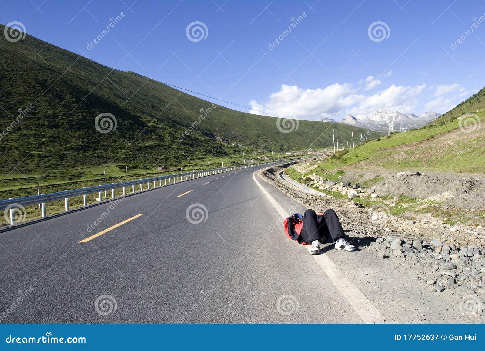 Tired man on road stock image. Image of exotic, grass 17752637