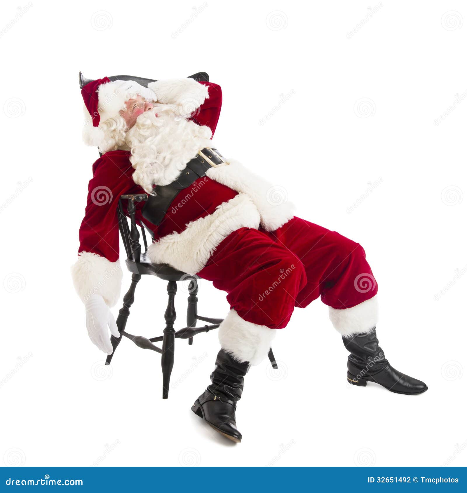 tired santa claus sitting on chair