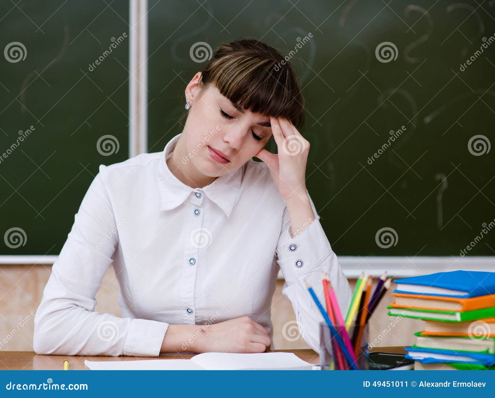 Tired teacher in classroom stock image. Image of people 49451011