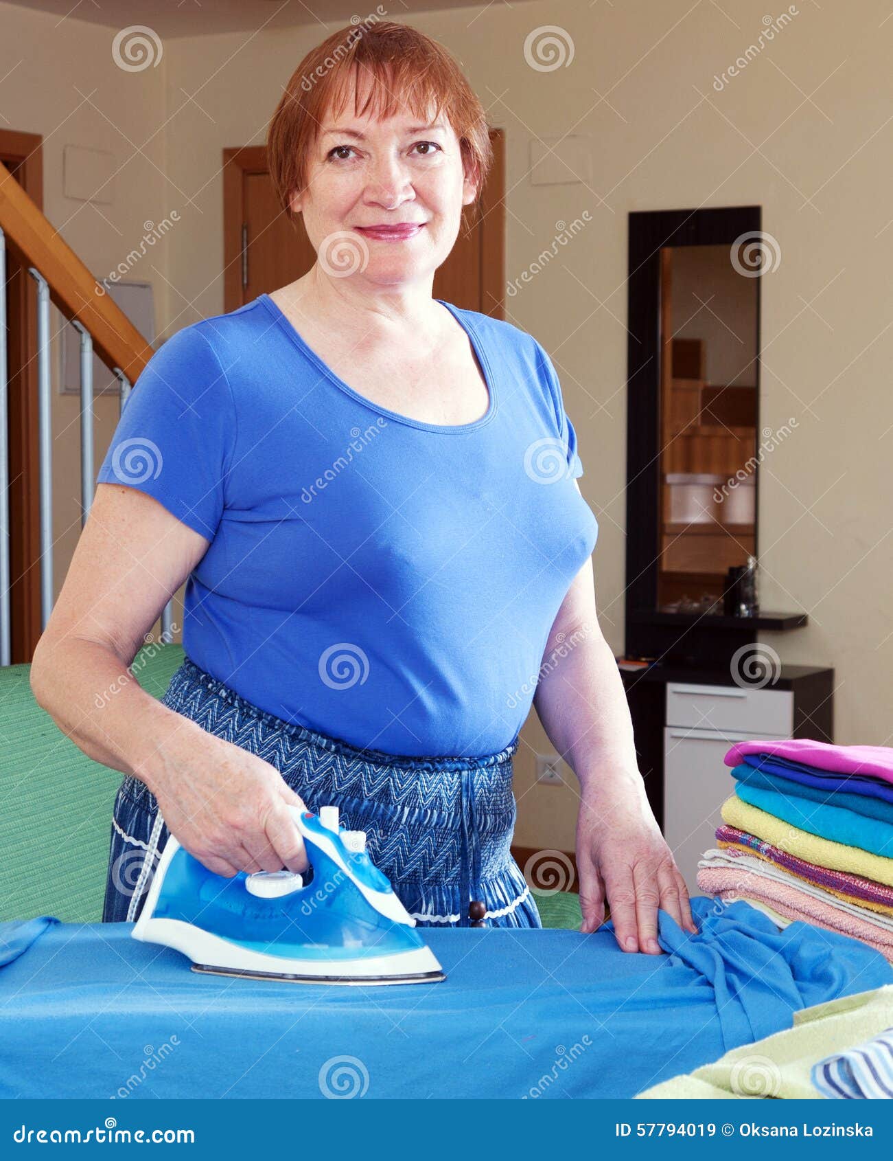 Tired woman irons clothes stock image. Image of clean 57794019