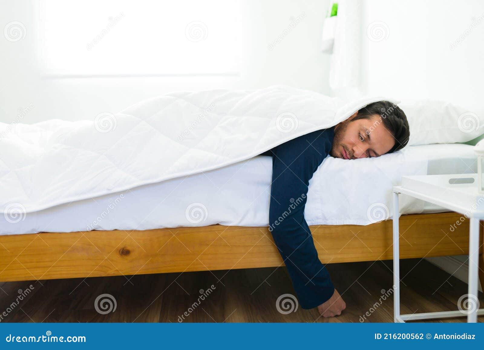 Latin Man Resting in Bed after a Hard Day Stock Photo - Image of latin ...