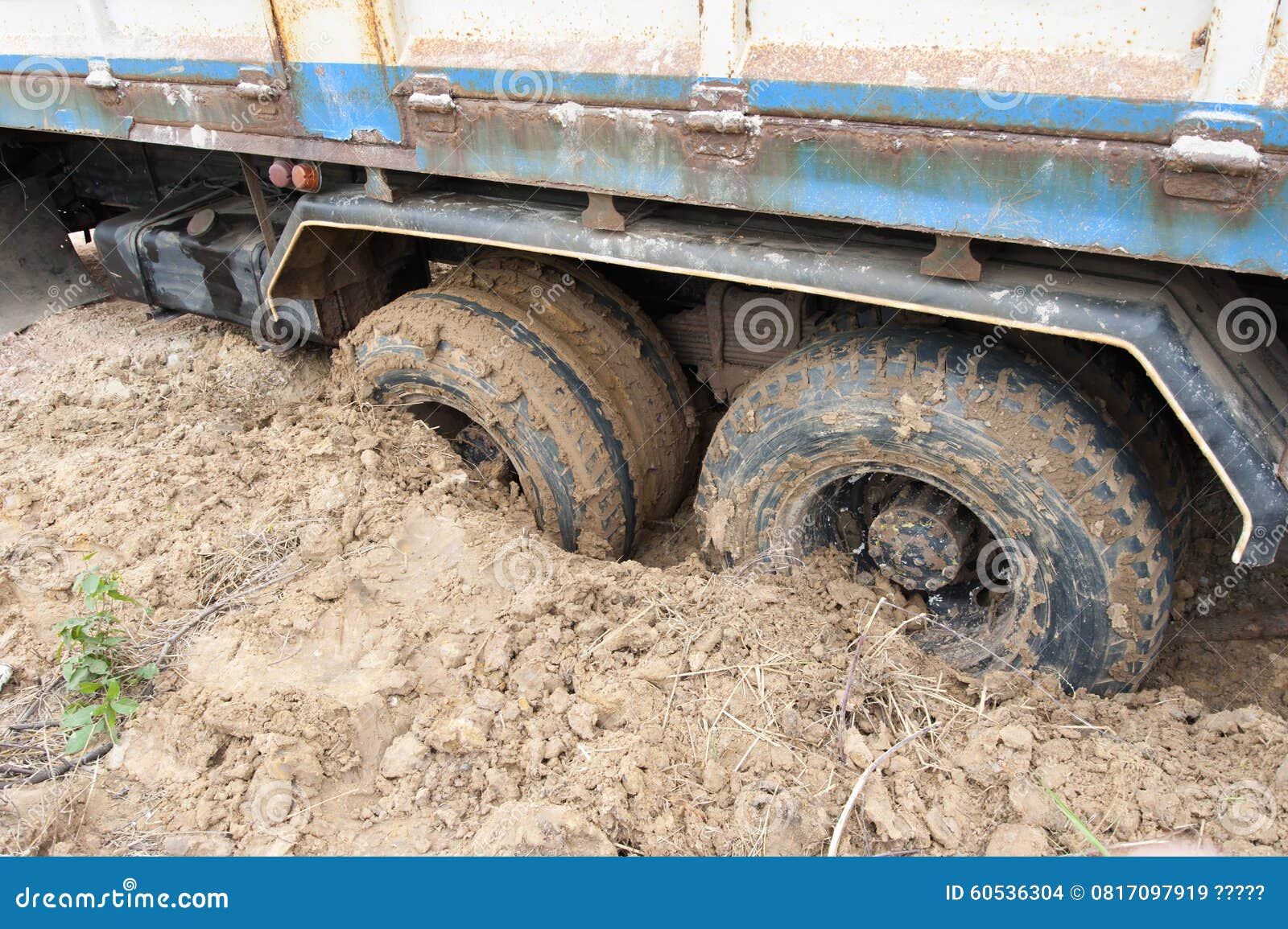 Tires down into the mud stock photo. Image of heavy, terrain 60536304