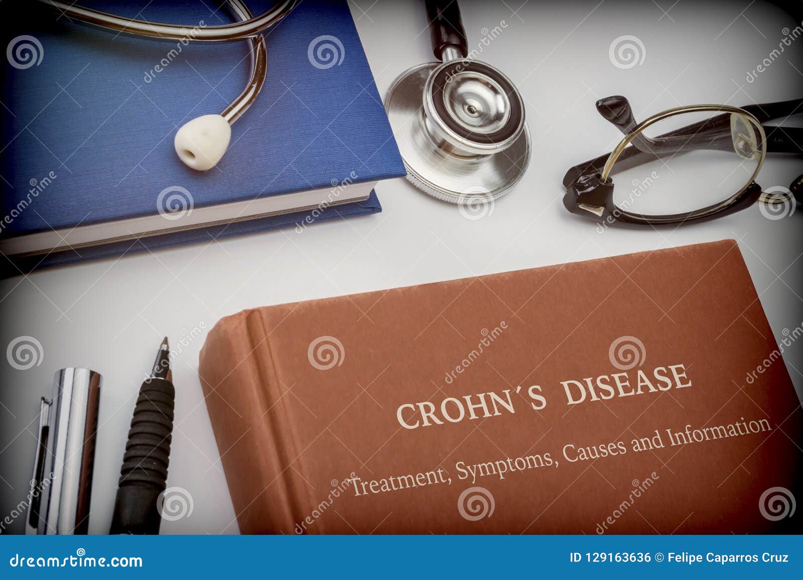 titled book crohn`s disease along with medical equipment
