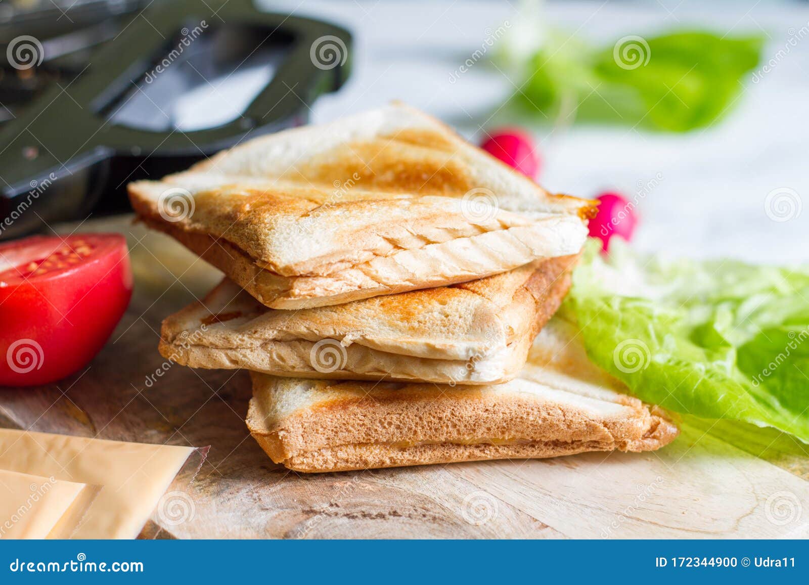 toast with toaster sandwich maker  breakfast concept and ingredients