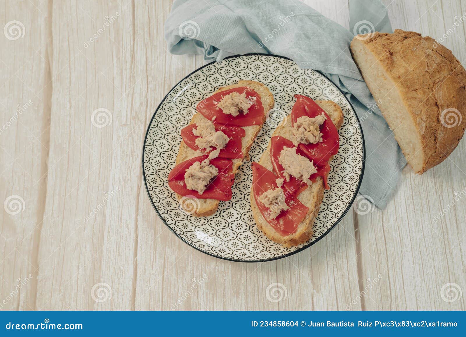 Toasted Appetizer of Peppers with Tuna Belly. Typical Spanish Tapa