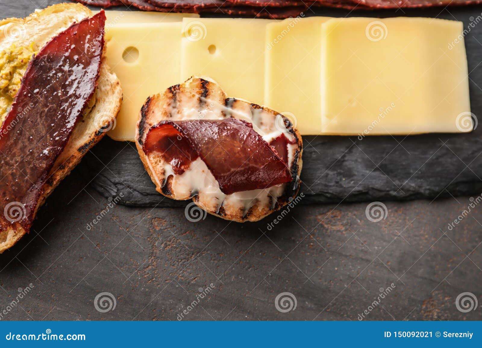 Toasted Bread with Meat and Cheese on Table Stock Image Image of