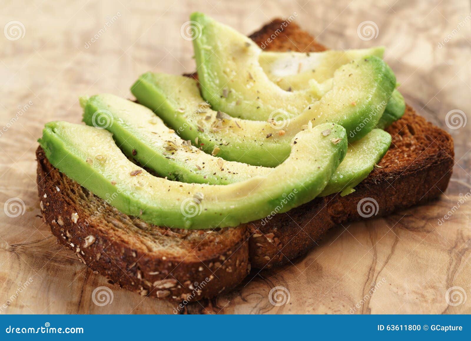 Toasted Rye Bread with Sliced Avocado and Herbs Stock Photo Image of
