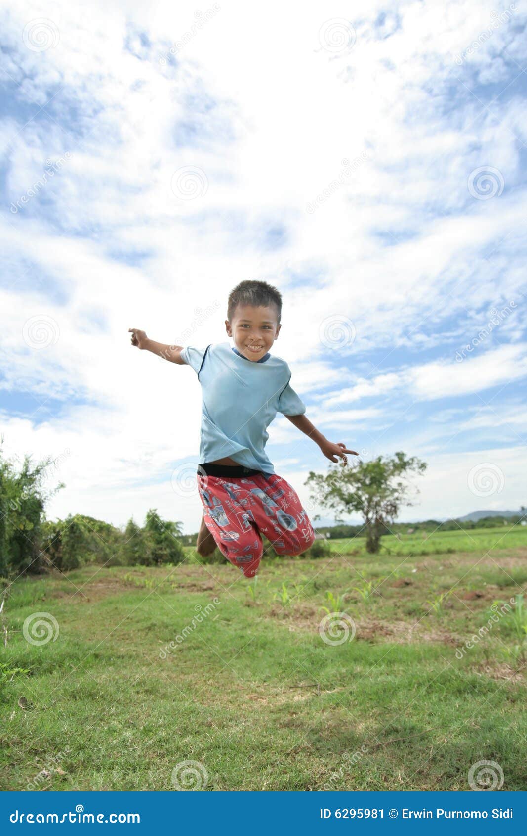 toddle jump at field