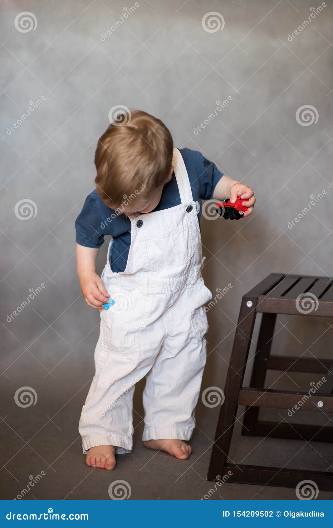 Unsupervised Toddler Climbing A Dangerous High Balcony Railing. Risky