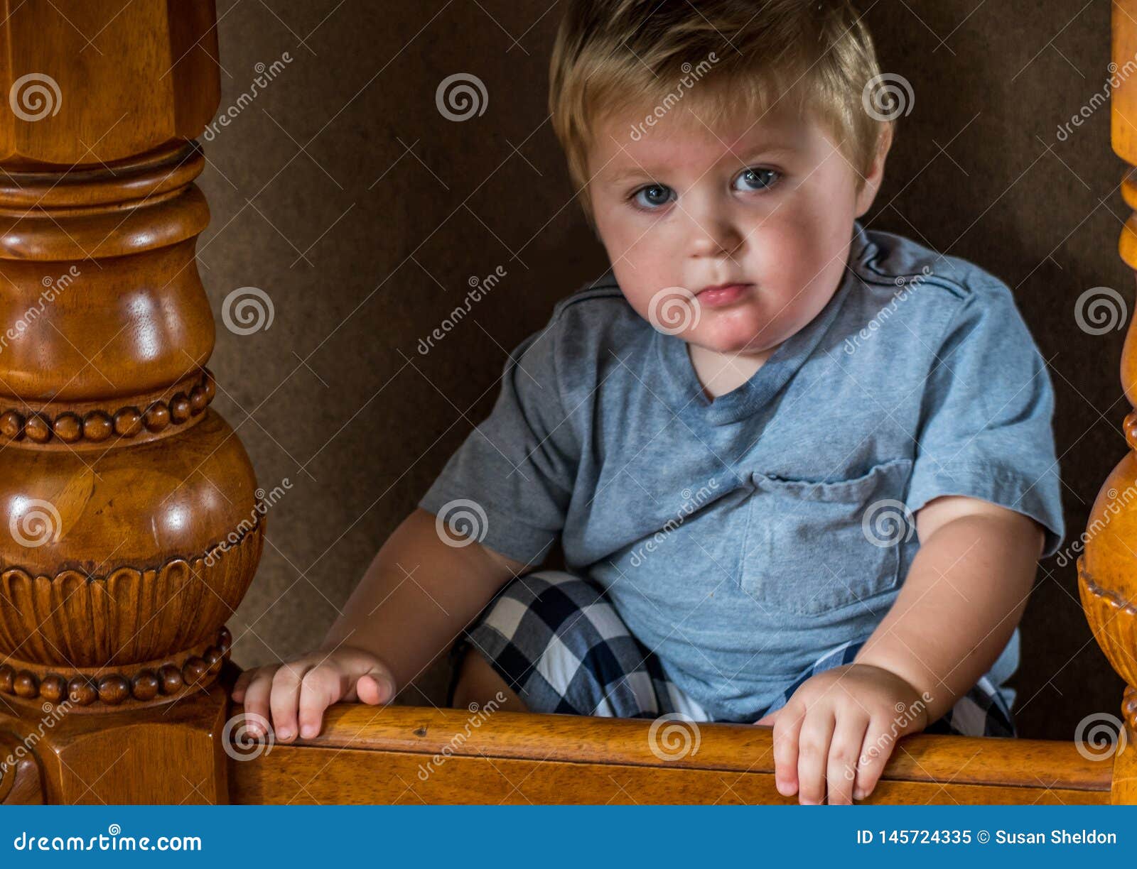 Toddler Boy Hiding Under a Table Stock Image Image of close, furniture 145724335