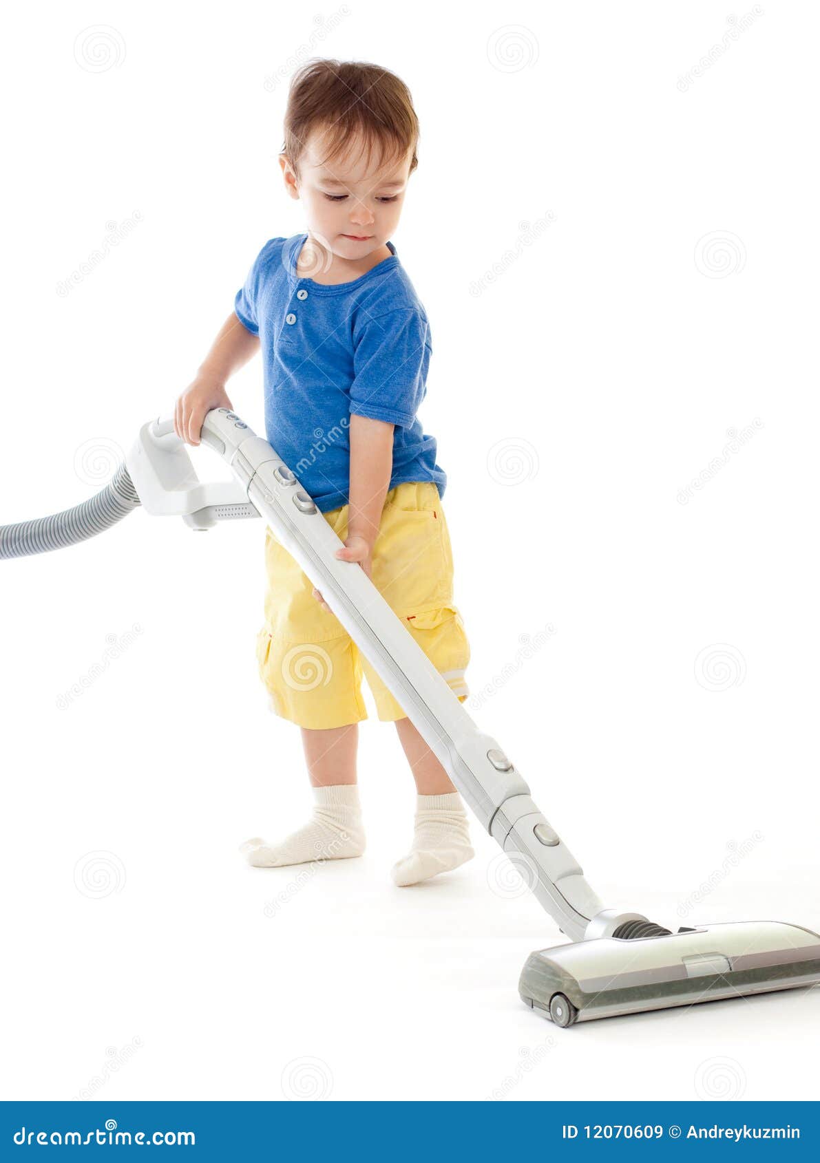 Toddler Is Cleaning Room With Vacuum Cleaner Royalty Free Stock Images