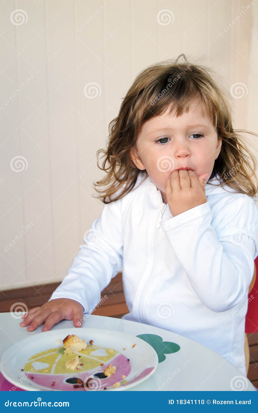 Toddler eating cake stock photo. Image of white, girl 18341110