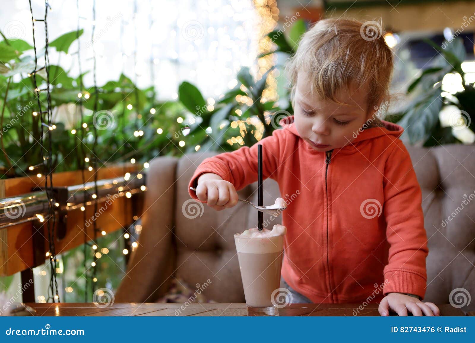 Toddler Eating Foam of Cocoa Stock Photo Image of holding, cappuccino