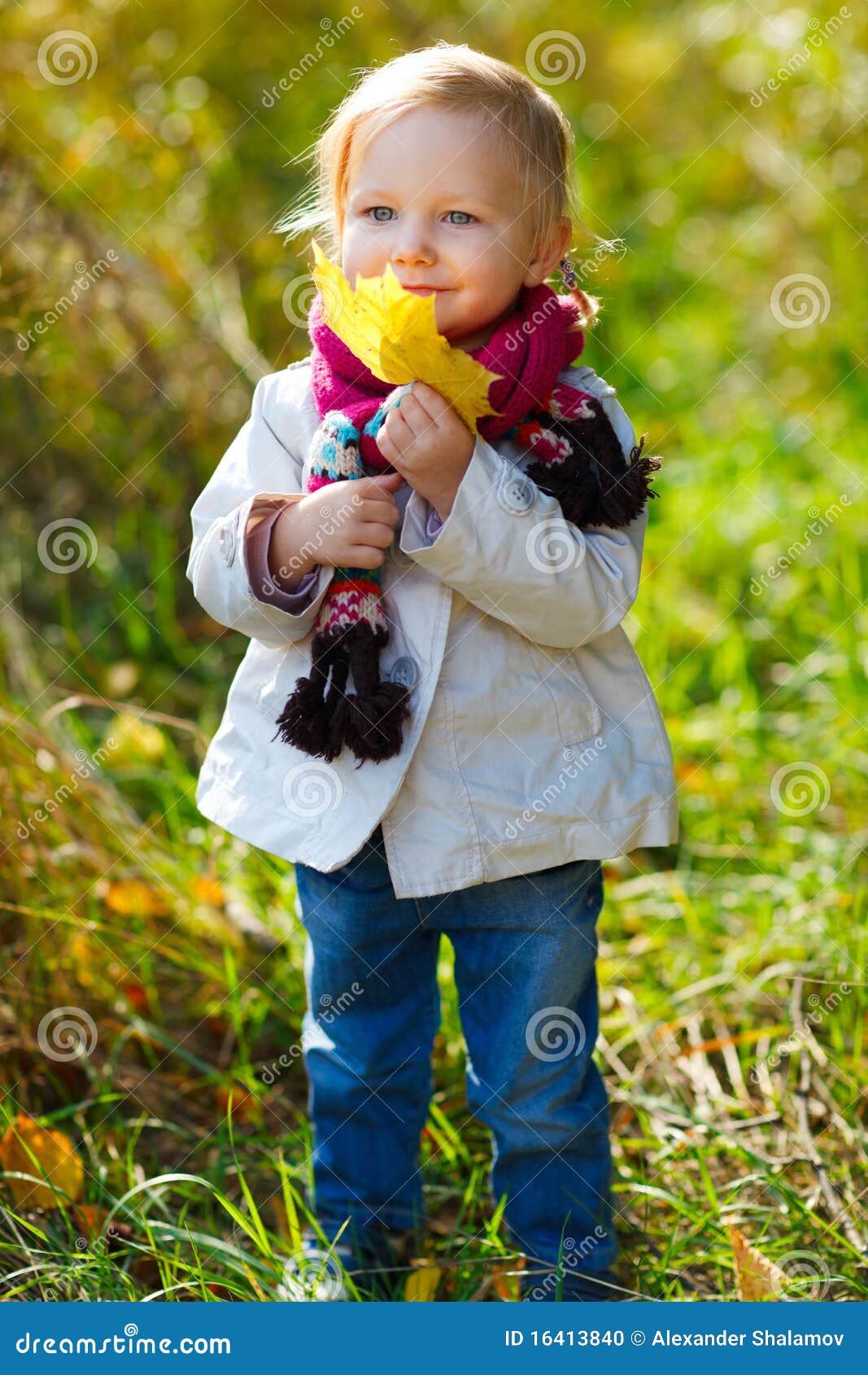 Toddler Girl with Yellow Leave Stock Photo Image of outside, adorable