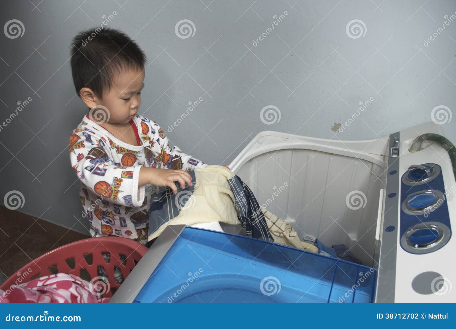 Toddler help wash coverlet stock photo. Image of baby 38712702