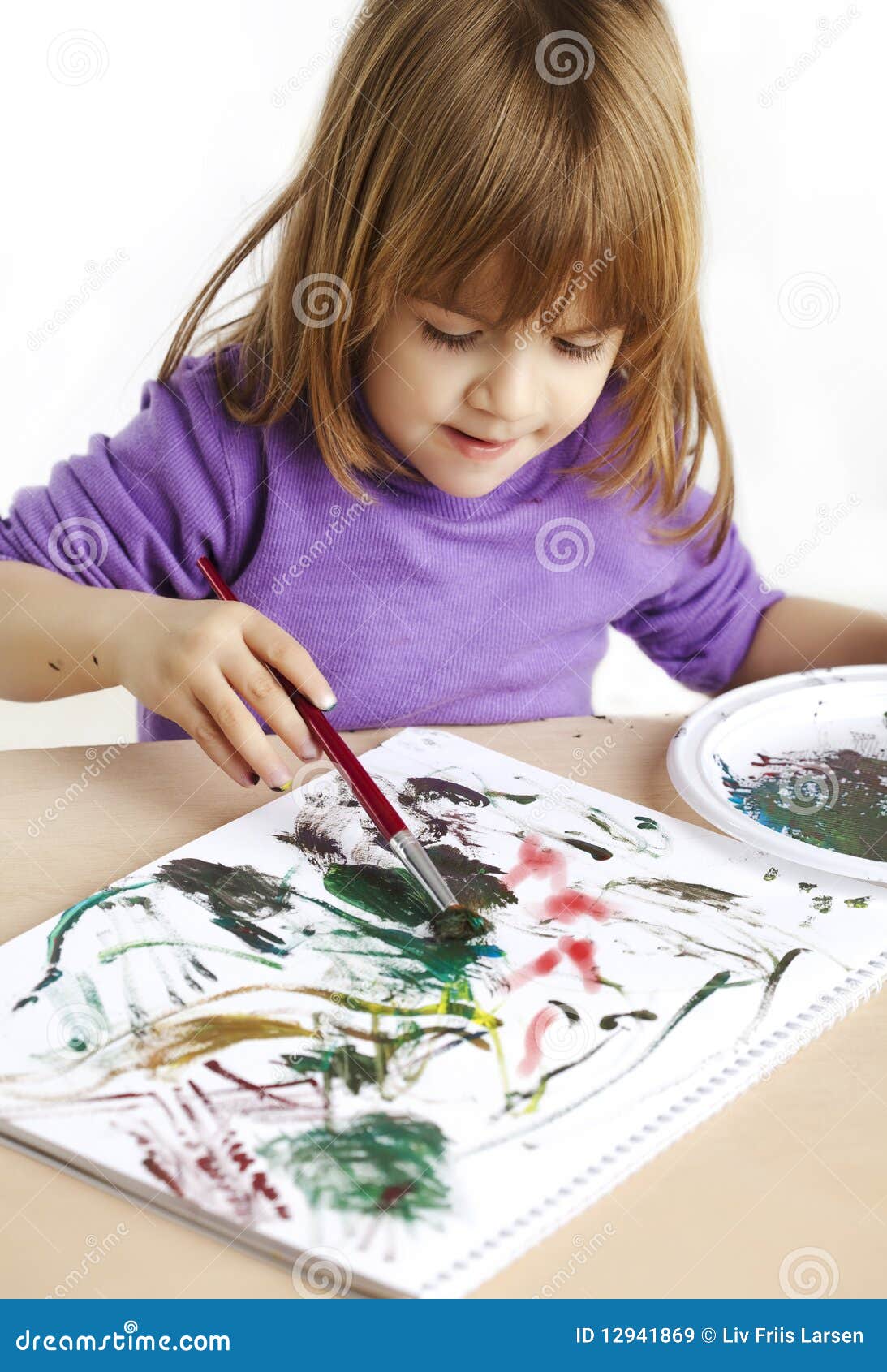 Toddler painting stock image. Image of cute, colourful 12941869