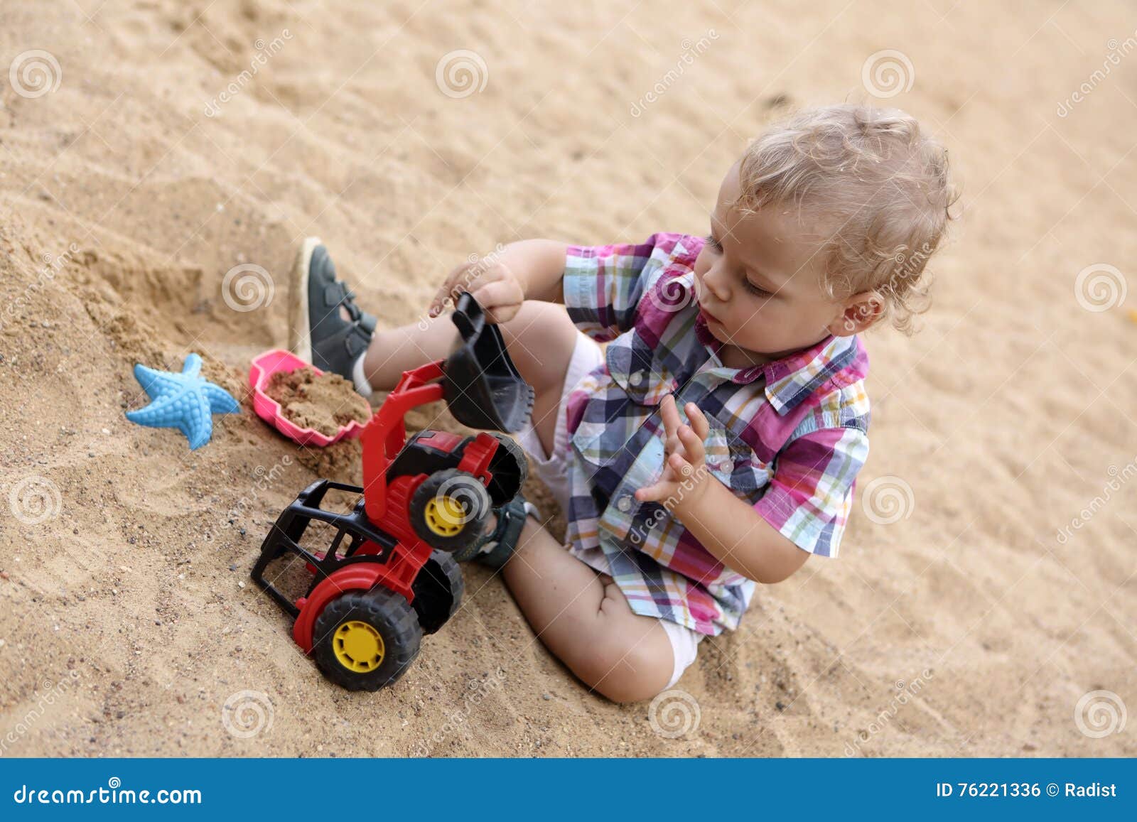 Little Boy Playing with Color Toys on Floor Stock Photo - Image of  bulldozer, little: 19039326