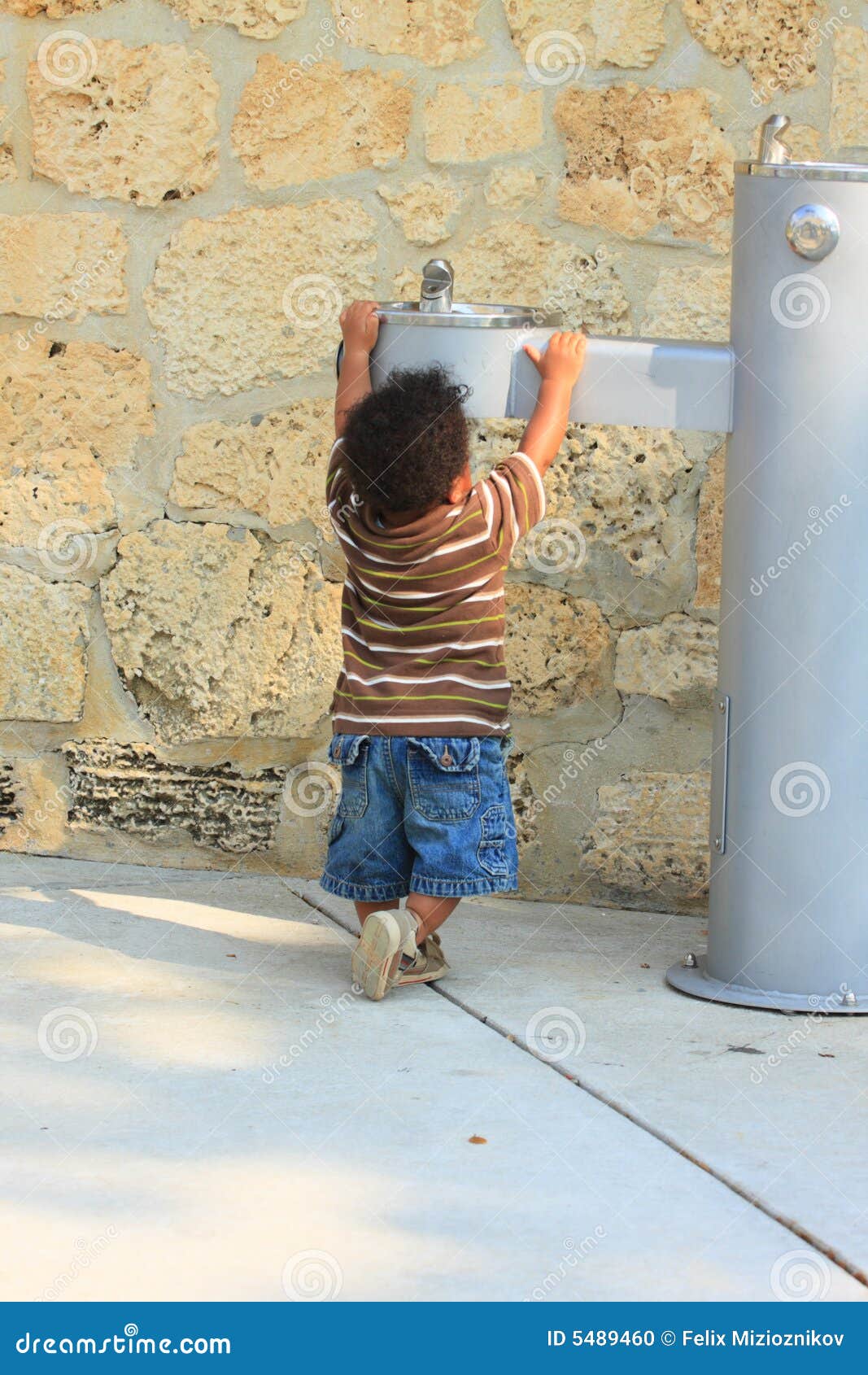 toddler reaching for water