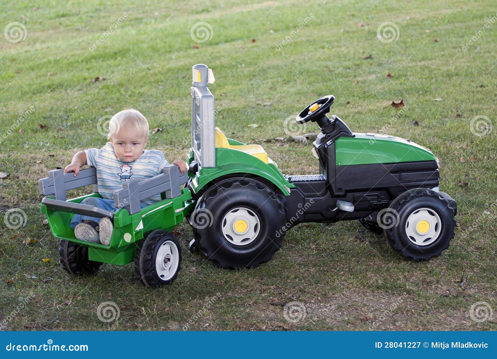 Toddler with tractor stock image. Image of playing, vehicle 28041227