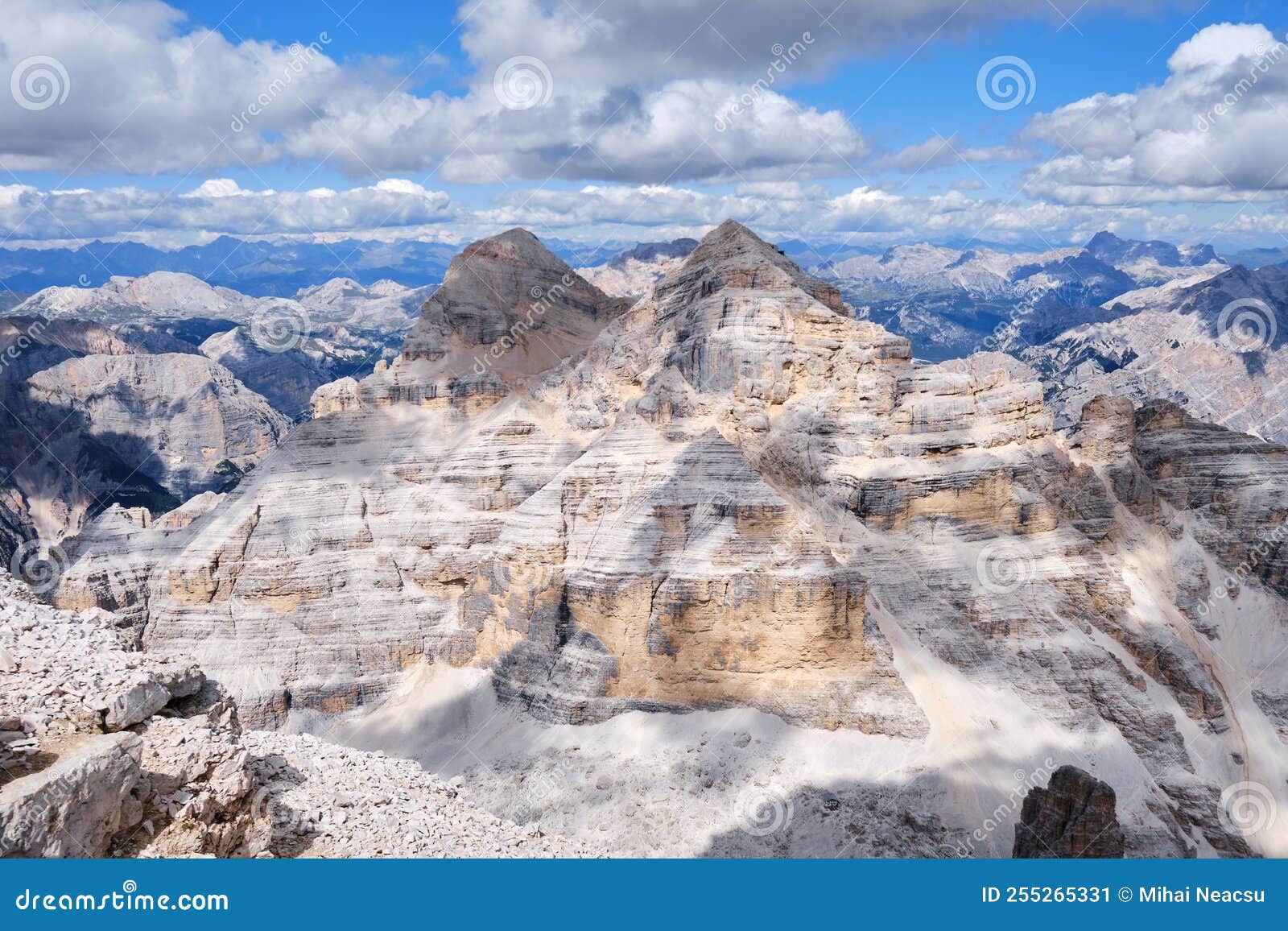 tofana di mezzo and di dentro peaks in dolomites mountains, italy, with cloud shadows on a bright summer day. alps, summit.