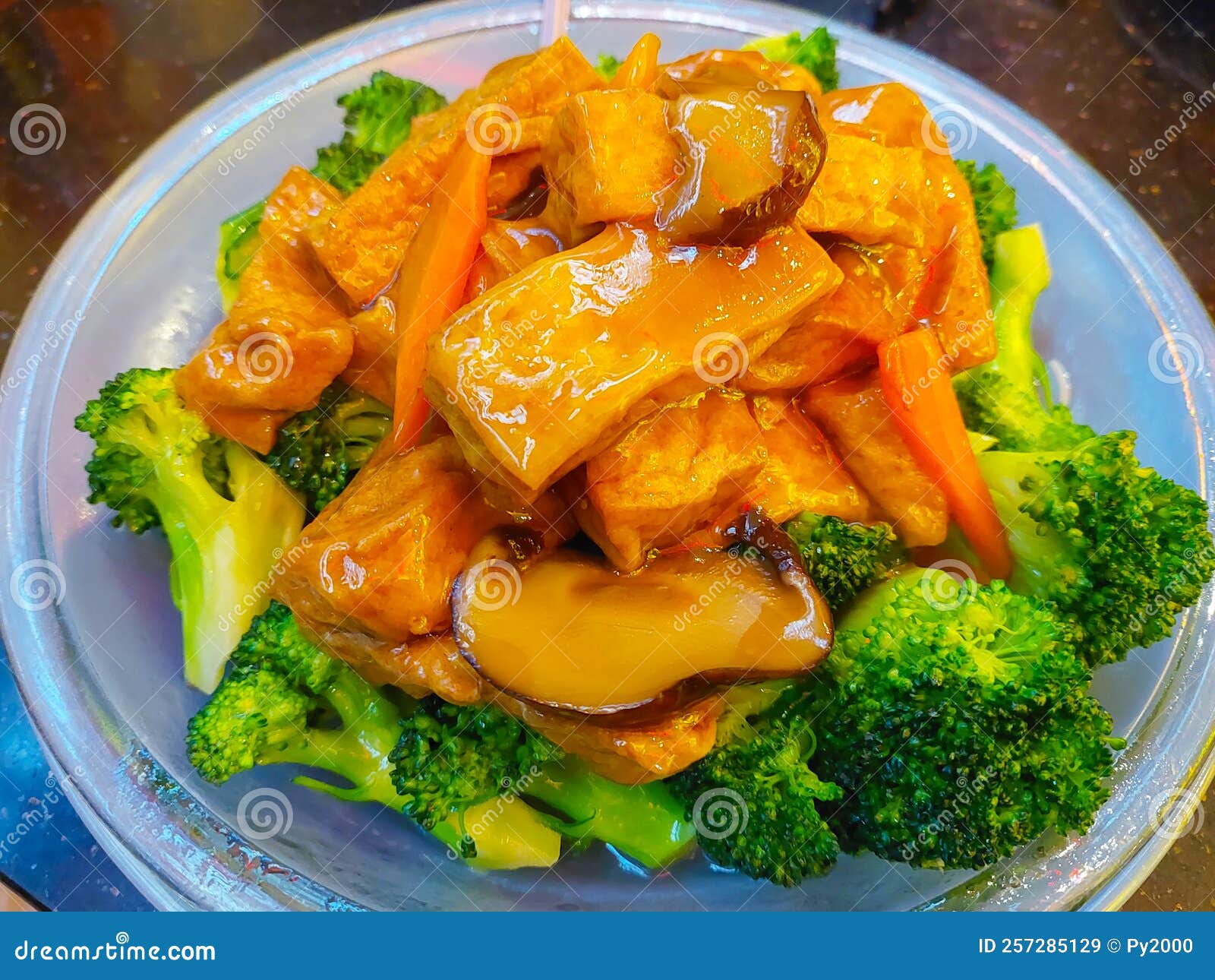 Tofu and Broccoli Stir Fry stock image. Image of sauce - 257285129