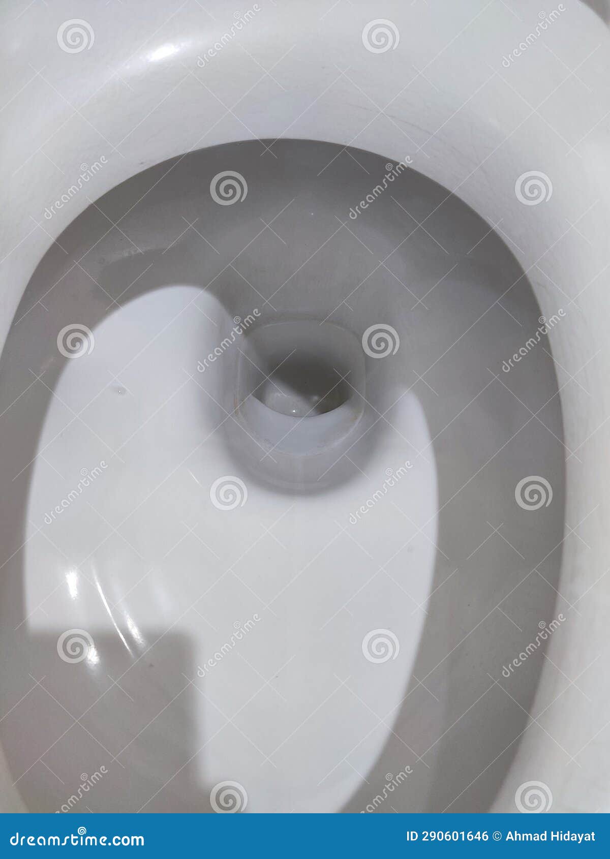 Toilet, Flushing Water, Close Up Illuminated by Artificial Light Stock